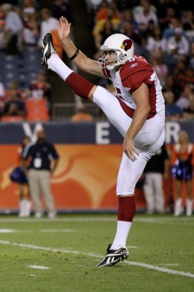Ben Graham punts the ball during NFL preseason action in Denver, Colorado in September 2009.