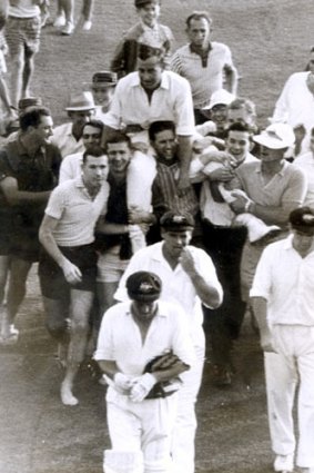 Ian Meckiff is chaired off the field by spectators after the innings in which he bowled only one over and was no-balled 4 times in the first Test against South Africa in Brisbane. Meckiff did not play for Australia again.