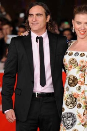 Joaquin Phoenix and Scarlett Johansson at the premiere of <em>Her</em>.