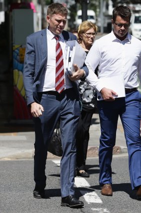 Murder accused Gable Tostee (right) arrives at the court on Thursday with his lawyer Nick Dore (left).