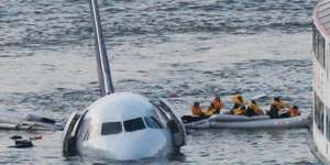 Passengers escape US Airways flight 1549 after Captain Chesley Sullenberger was able to safely land it in the Hudson River. 