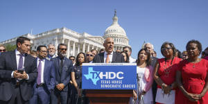 State Representative Chris Turner,chairman of the Texas House Democratic Caucus,and Democratic members of the Texas legislature hold a news conference at the Capitol in Washington.