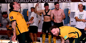 Jackson Irvine (left) celebrates Australia’s World Cup qualifying win over Peru.