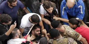 Scuffles break out between protesters and Lebanese army soldiers in Jal al-Dib,north of Beirut,on Wednesday.