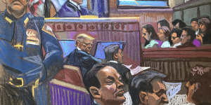 In this courtroom sketch,former president Donald Trump (centre) looks over his shoulder as he sits next to his lawyer,Todd Blanche,on the second day of jury selection for his criminal trial in Manhattan.