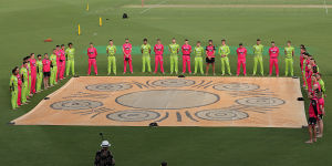 Sixers and Thunder players take part in a barefoot circle before last week's Sydney Smash in Canberra.