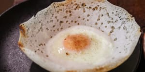 Crisp,yeasty,bowl-shaped egg hoppers.