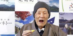 Masazo Nonaka of Japan eats cake on April 10,2018,after the Guinness World Records recognised him as the world’s oldest living man at the age of 112 years and 259 days.