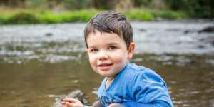 Alexander Glenister,2,enjoys the clean water at Warrandyte Bridge.