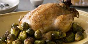 Brined and stuffed roast chicken with honeyed brussel sprouts by Karen Martini. To be used for upcoming recipe pages in Epicure/Good Food. Styling by Marnie Rowe,photographs by Marcel Aucar. Please credit.