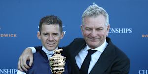 Jason Collett and Kris Lees with the Sydney Cup.