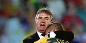 Good times:Coach Guus Hiddink savours Australia's qualification for the 2006 World Cup.