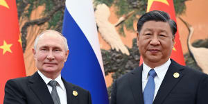 Vladimir Putin and Xi Jinping in Beijing this month.