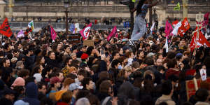 Protesters gather at the Place de la Concorde near the National Assembly in Paris.