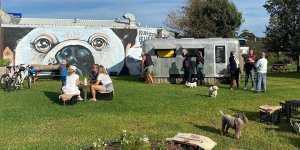 People enjoy a coffee from Frankie’s Coffee Van in Culburra.