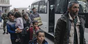 Refugees from Nagorno-Karabakh arrive in Goris,Armenia,on Sunday.