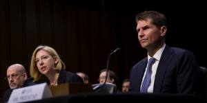 Jeanette Manfra of the Department of Homeland Security speaks while Bill Priestap,of the FBI,right,listens during a congressional hearing on sanctions against Russia.