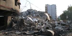 Retaliatory Israeli airstrikes destroyed whole apartment blocks in Gaza City.