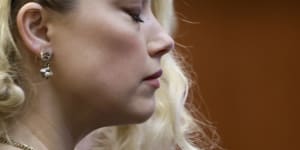 Amber Heard waits for the verdict to be read.