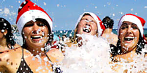 4. BONDI BEACH,AUSTRALIA. Come 25 December the beach acts as a magnet for backpackers a long way from home,who celebrate alongside other'Christmas orphans.'Bands and DJs rock the Pavilion,everyone checks out everyone else,and a festive atmosphere prevails.