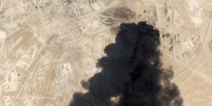 A satellite image from Planet Labs shows thick black smoke rising from Saudi Aramco's Abqaiq oil processing facility in Buqyaq,Saudi Arabia. 