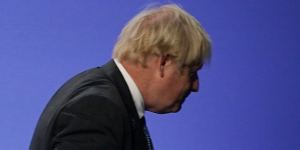 British Prime Minister Boris Johnson leaves the Glasgow climate summit on Wednesday. 