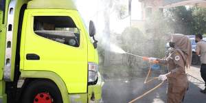 A livestock truck being sprayed with disinfectant at Lembar port,West Lombok,in the province directly east of Bali.