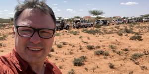 Matt Wade with the World Vision convoy and armed escort in Somaliland.