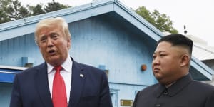 President Donald Trump meets North Korean leader Kim Jong-un at the border village of Panmunjom in the Demilitarised Zone,South Korea on Sunday.