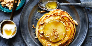 Fresh pear pancakes with almonds,sour cream and honey.