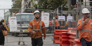 Barriers remain along much of Devonshire Street in Surry Hills more than three months after they were supposed to be removed.