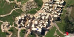 This aerial view shows a Middle Eastern-style village constructed by the Jehovah’s Witness religious group in Denham Court in south-west Sydney. 
