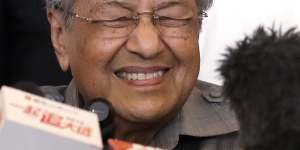 Mahathir Mohamad tells the media he has a clear mandate to form a new government in Malaysia.