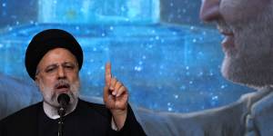 Iranian President Ebrahim Raisi speaks during a commemoration for the late Revolutionary Guard General Qassem Soleimani in Tehran on Wednesday.