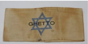 A World War II star of David armband worn by Jews in Nazi ghettos. It has a bid of $280 and is estimated to be worth up to $500.