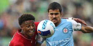 City’s Nuno Reis is challenged by Kusini Yengi.