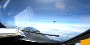 Chinese jet flies across path of US spy plane.