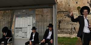 Orthodox Jewish males in front of the Al Aqsa Mosque compound in Jerusalem.