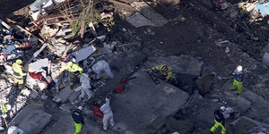 Crews are continuing their search for a woman believed to be under the rubble at Whalan.