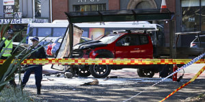 Four men injured after ute crashes into bus shelter near Broadway shopping centre