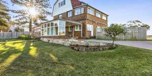 The Cameron family have bought the Cape Cod-style house overlooking Newport and Bungan beaches. 
