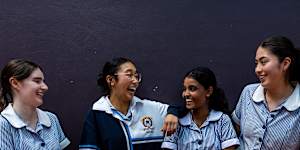 It’s over:HSC students Rebecca Price,Rhiannon Trang,Tamika Rodrigo and Sarah Johnston relax following their final year 12 Higher School Certificate (HSC) exam at Mercy College in Chatswood.