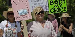 Abortion-rights demonstrators carry signs during a march in Chattanooga,Tennessee in May.