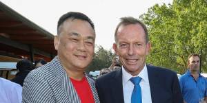 Jack Lam and Tony Abbott the Twin Creeks Golf and Country Club in 2018. 