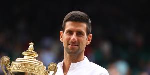 Novak Djokovic with the Wimbledon trophy.