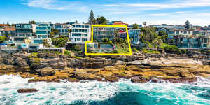 The estate of Alan Cardy originally listed the two clifftop houses in one line with $25 million hopes. Combined they sold for more than that.