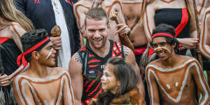 Jake Stringer with Indigenous performers at the Dreamtime at the'G rehearsal.