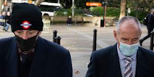 Chris Dawson (right) arrives at the NSW Supreme Court on Friday with his older brother,Peter Dawson.