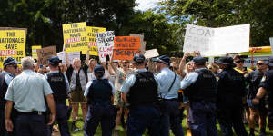 A barricade blocked protesters from seeing Scott Morrison.