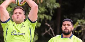 Hookers Dave Porecki and Folau Faingaa practice throwing at Wallabies training.